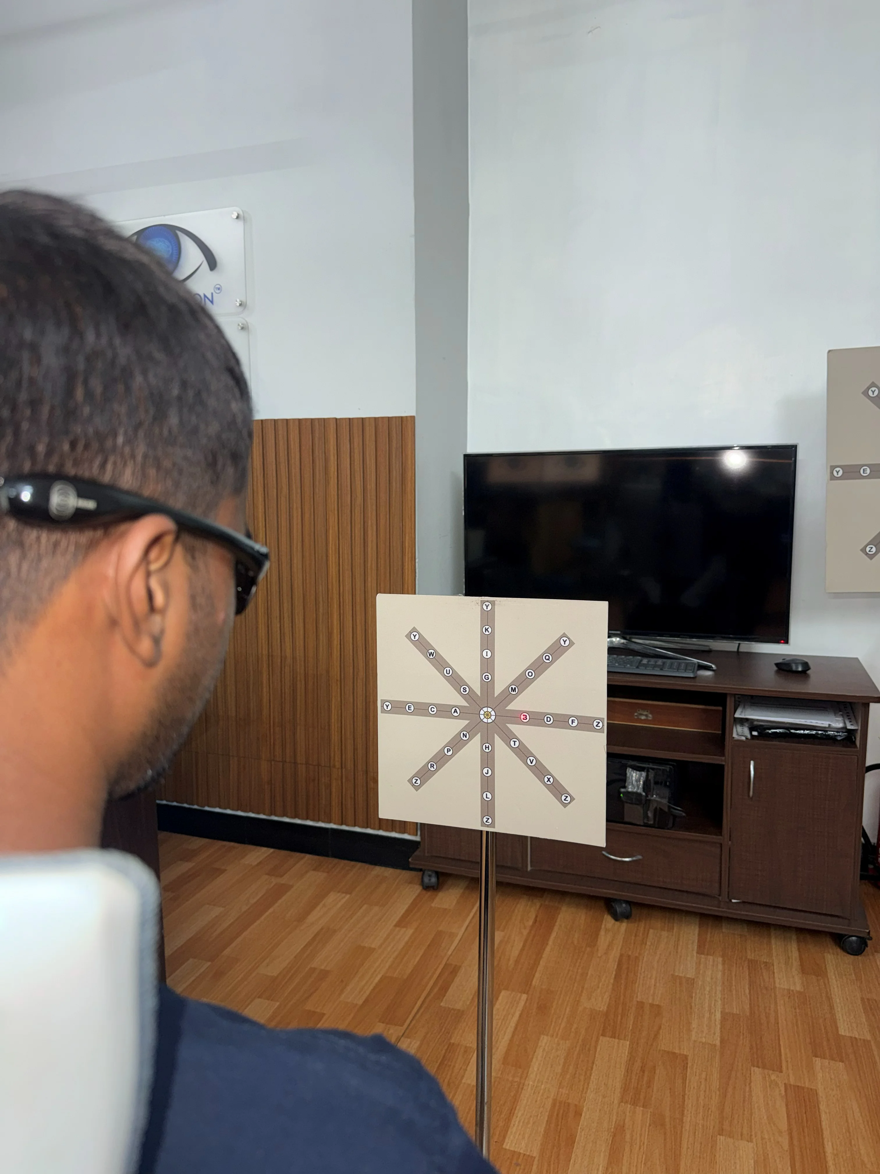 Caring Vision Therapy Ashok Nagar Chennai - Close-up of radial suppression card used during anaglyph vision test