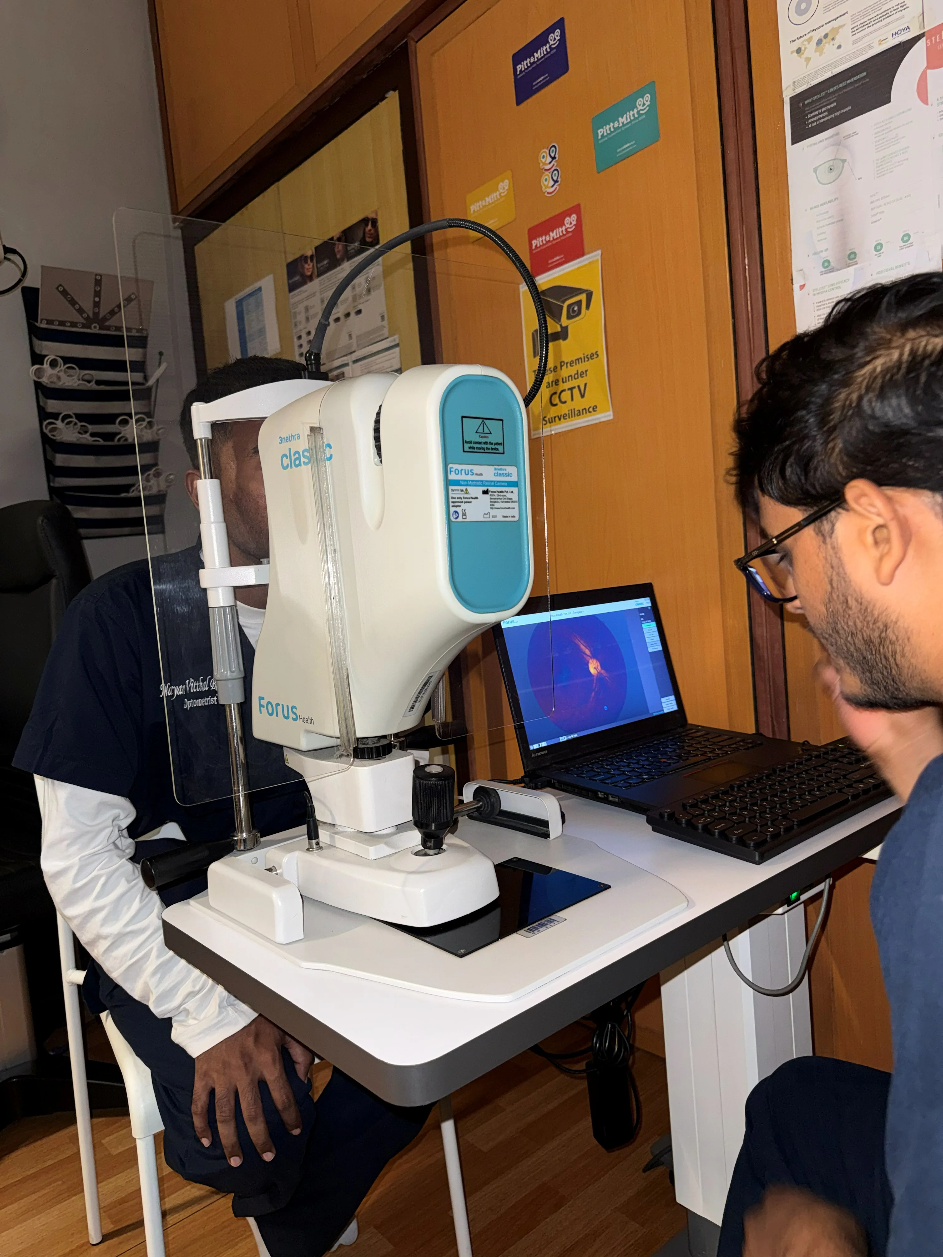 Caring Vision Therapy Ashok Nagar Chennai - Patient undergoing auto-refractor eye exam session