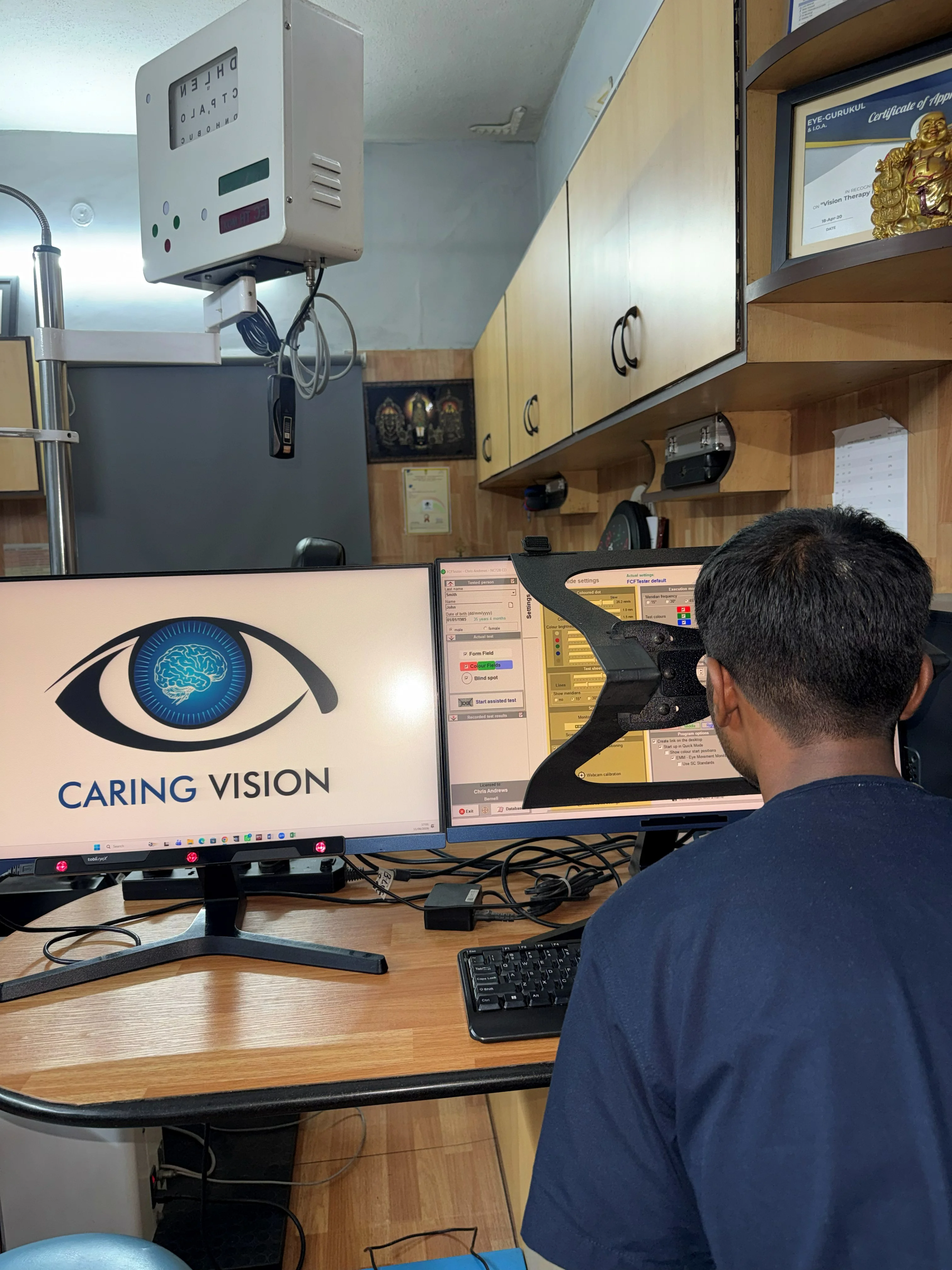 Caring Vision Therapy Ashok Nagar Chennai - Close-up view of patient using binocular vision instrument