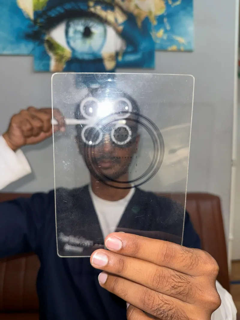 Caring Vision Therapy Ashok Nagar Chennai - Patient performing lens flipper accommodative exercise