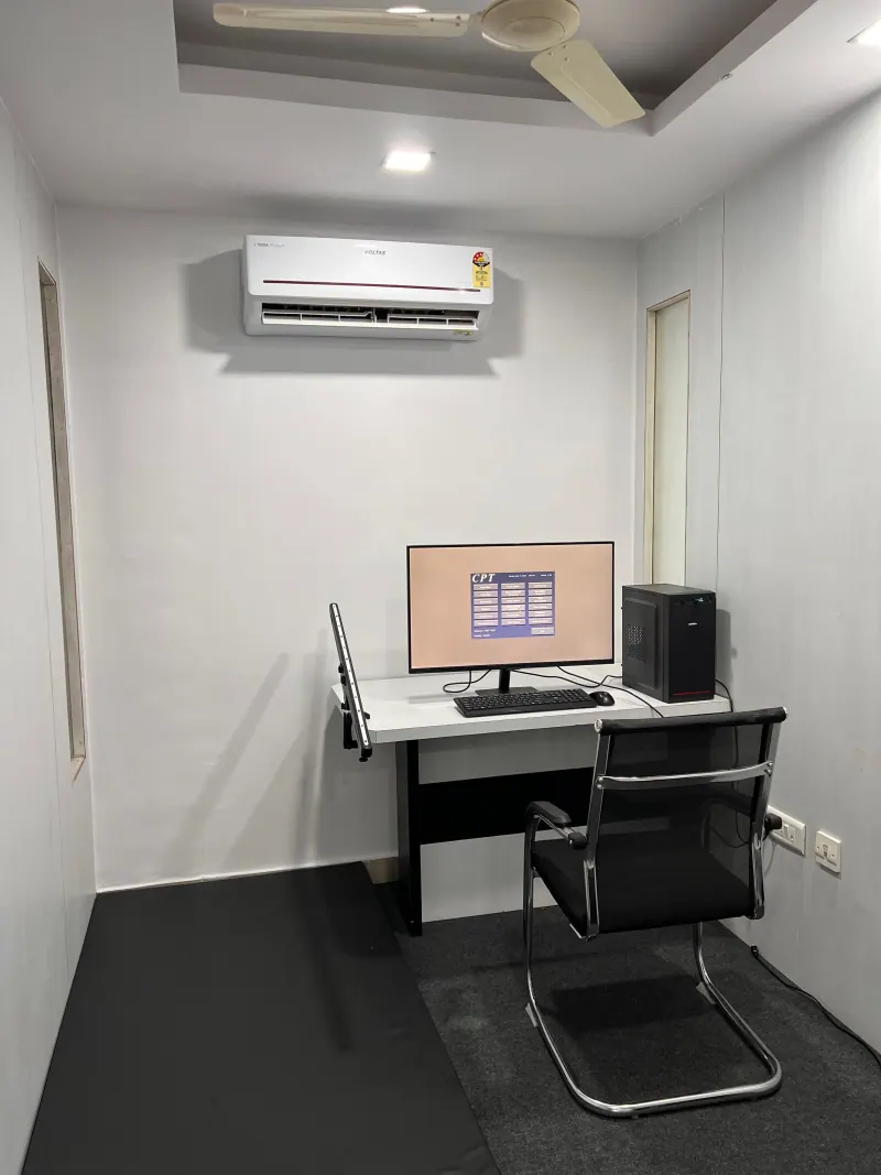 Caring Vision Therapy Hyderabad - Vision assessment workstation with computer and air-conditioned private room