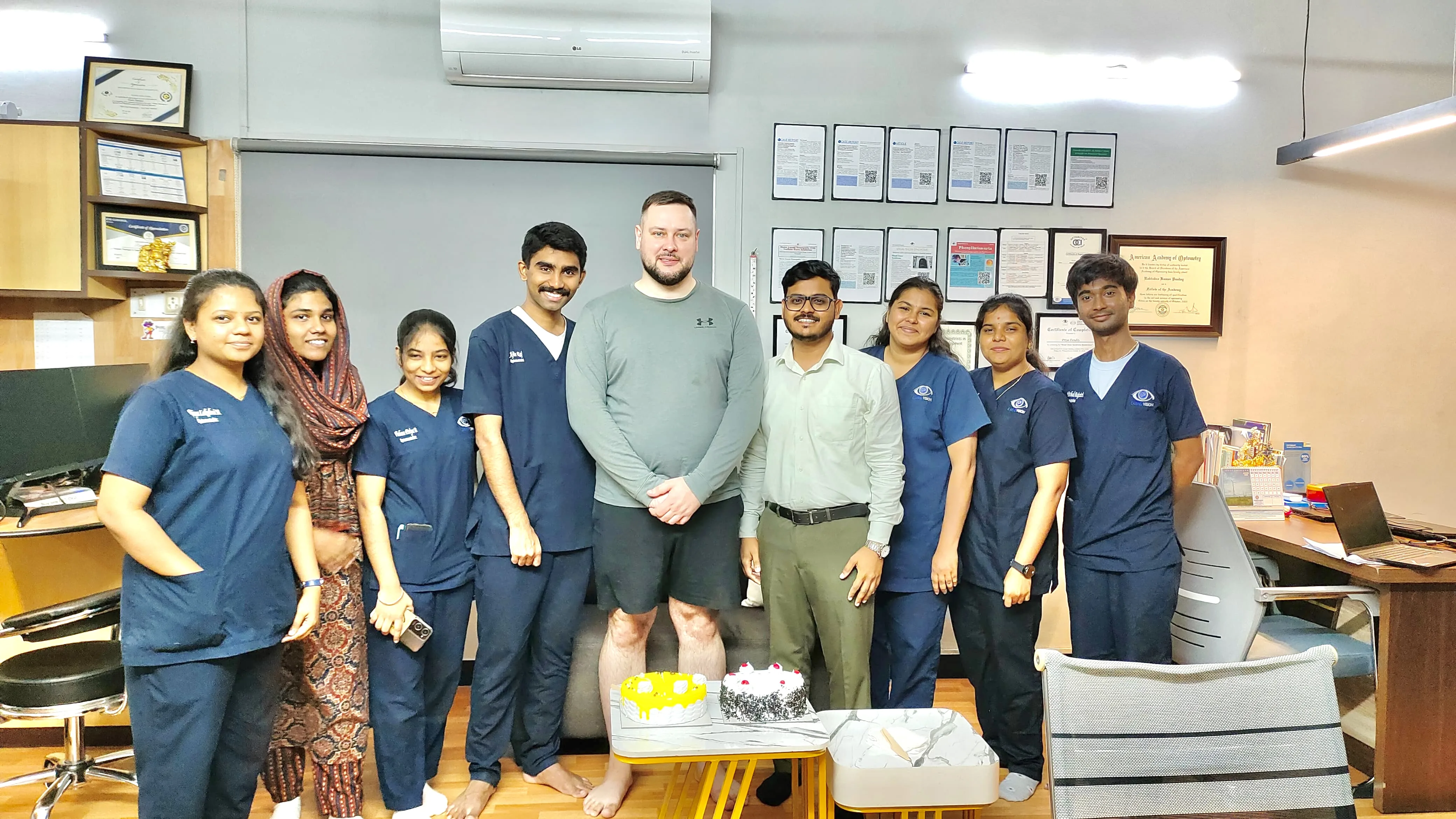 Cake cutting celebration with Vsevolod Tuchin and the Caring Vision Therapy team